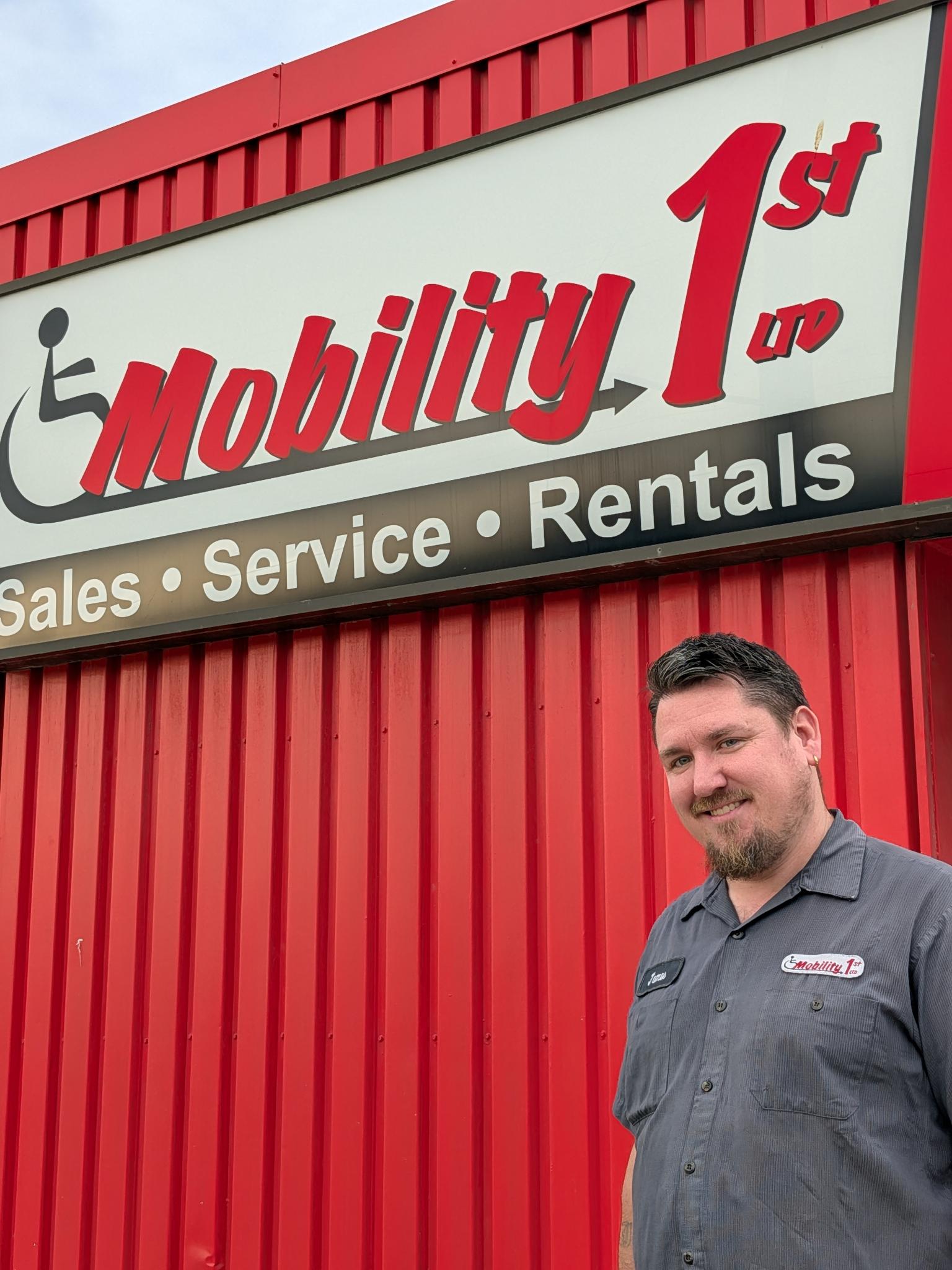 James in front of Mobility 1st store